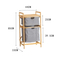 Double - Layer Bathroom Floor - Standing Bamboo and Fabric Storage Shelf as a Dirty Clothes Basket