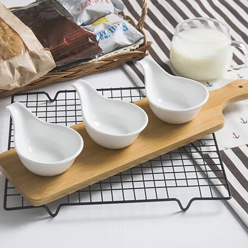 3 - Piece Set of Ceramic Serving Dishes on a Handled Bamboo Serving Tray for Sauce