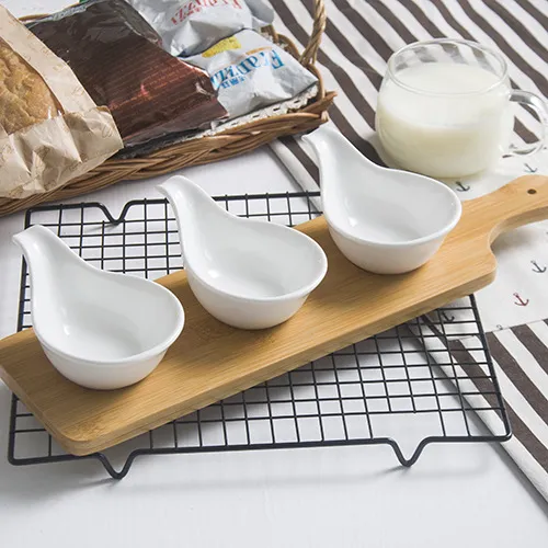3 - Piece Set of Ceramic Serving Dishes on a Handled Bamboo Serving Tray for Sauce